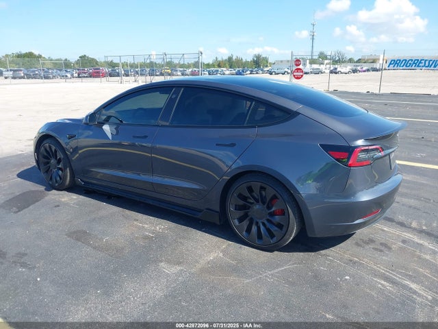 2023 TESLA MODEL 3 5YJ3E1EC8PF712596 Photo 2