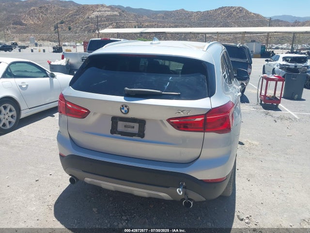 WBXHT3C37H5F87304 BMW X1