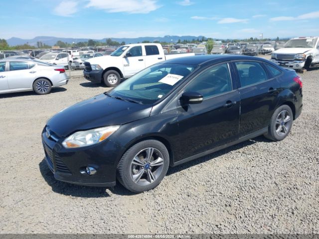 2014 FORD FOCUS 1FADP3F26EL454563 Photo 1