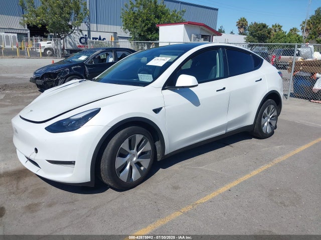 2023 TESLA MODEL Y 7SAYGDED8PF940577 Photo 1