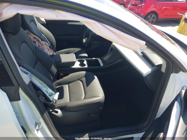 2023 TESLA MODEL Y 7SAYGDED8PF940577 Photo 4