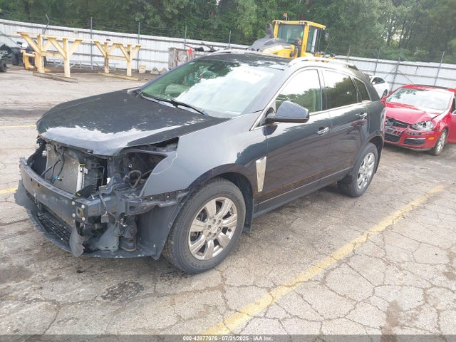 2015 CADILLAC SRX 3GYFNEE37FS629228 Photo 1