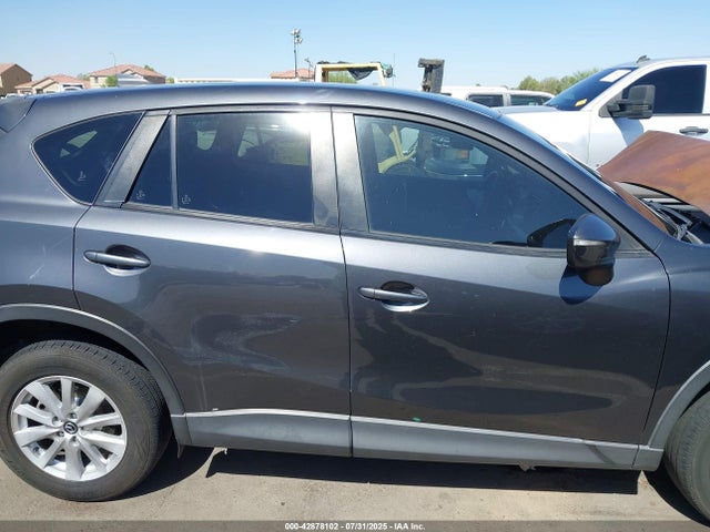 JM3KE2CY6G0887841 Mazda py