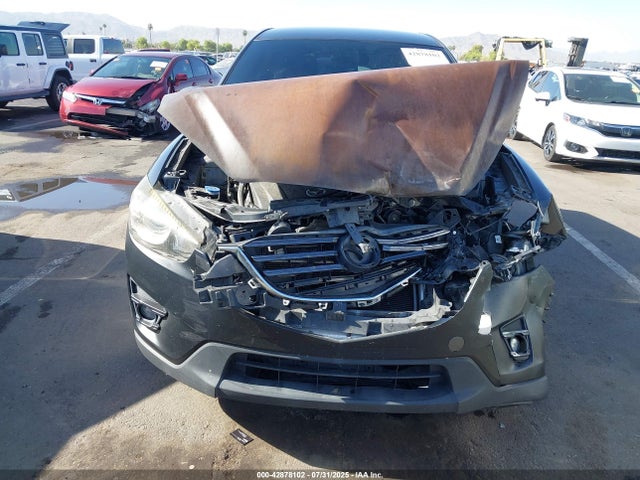JM3KE2CY6G0887841 Mazda py