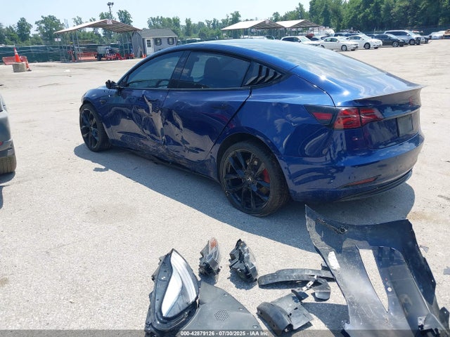 2021 TESLA MODEL 3 5YJ3E1EC4MF054738 Photo 2