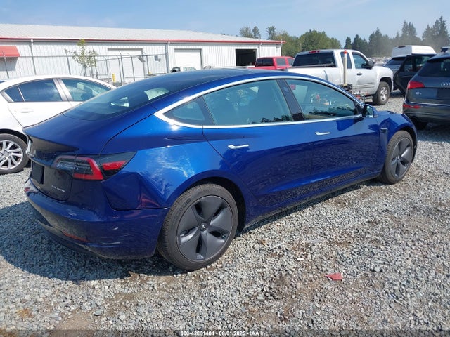 5YJ3E1EB1JF130676 Tesla 2018