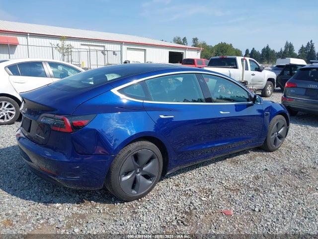 5YJ3E1EB1JF130676 Tesla 2018