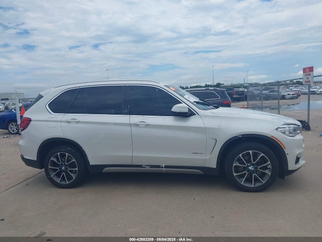 5UXKR2C56J0Z16103 BMW X5