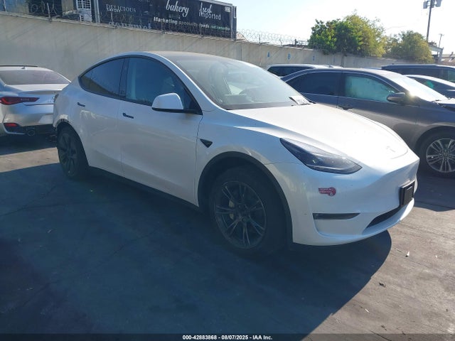 2024 TESLA MODEL Y 7SAYGDEE2RF121527 Photo 0