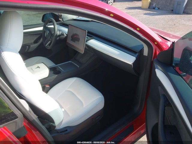 2023 TESLA MODEL Y 7SAYGDEFXPF714770 Photo 4
