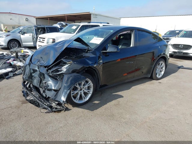 2023 TESLA MODEL Y 7SAYGAEE1PF594220 Photo 1