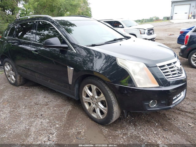 2014 CADILLAC SRX 3GYFNFE35ES529956 Photo 0