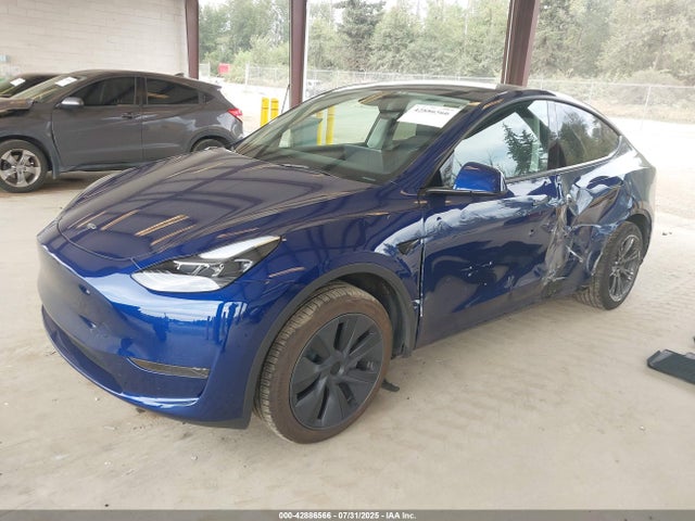 2024 TESLA MODEL Y 7SAYGDED5RF121075 Photo 1