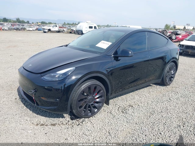 2024 TESLA MODEL Y 7SAYGDEF8RF162737 Photo 1