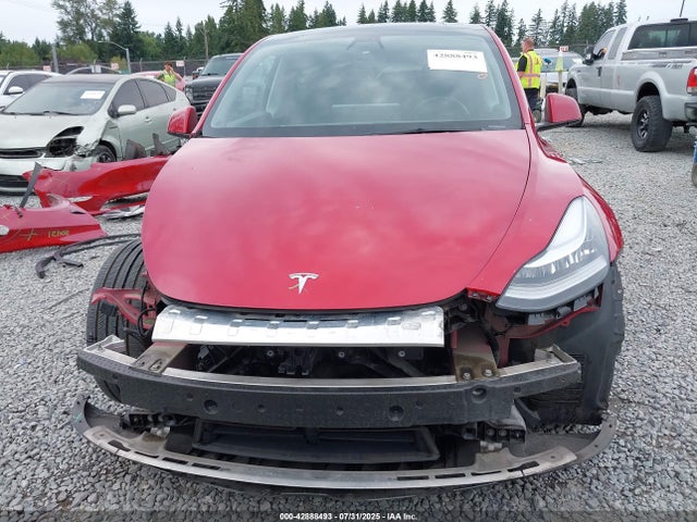 5YJYGDEE9MF203809 Tesla 2021