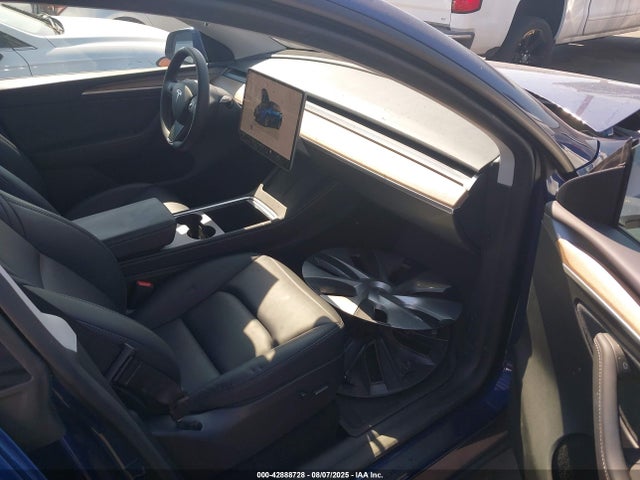 2023 TESLA MODEL Y 7SAYGAEE0PF859578 Photo 4