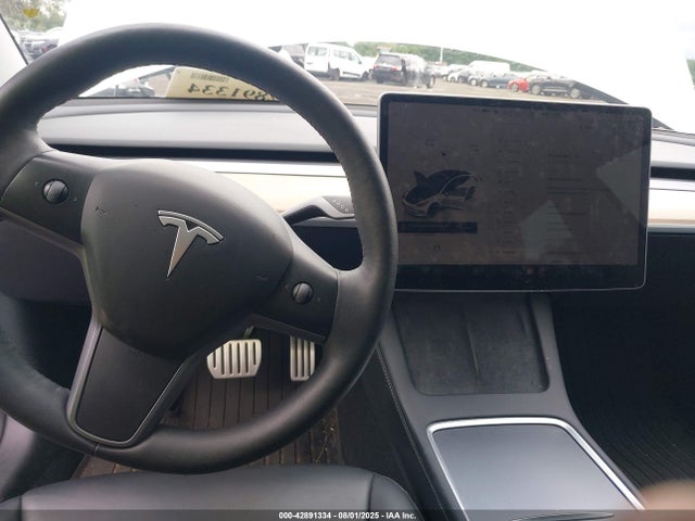 5YJ3E1EC3PF596742 Tesla 2023
