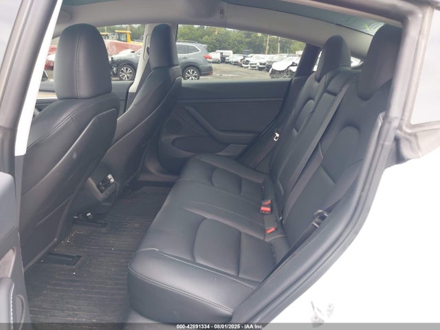5YJ3E1EC3PF596742 Tesla 2023