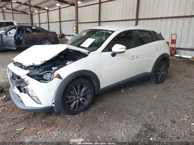 Mazda pe 2018 JM1DKDC75J0329404 Image 2