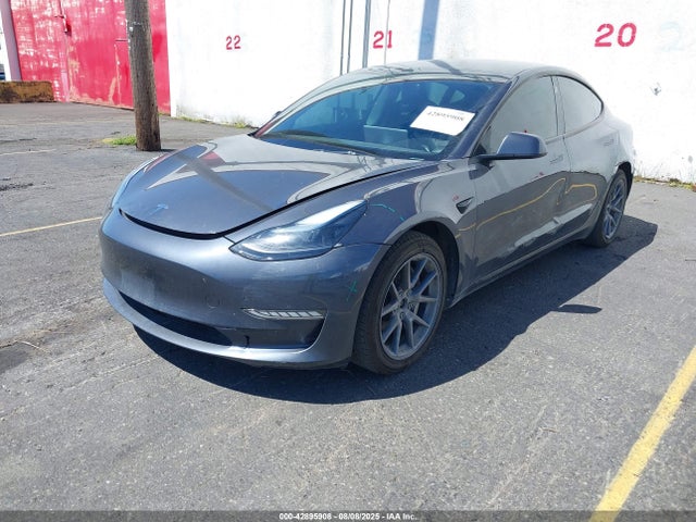 2023 TESLA MODEL 3 5YJ3E1EB8PF699324 Photo 1