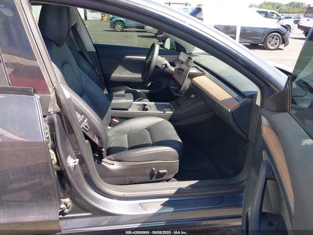 2023 TESLA MODEL 3 5YJ3E1EB8PF699324 Photo 4