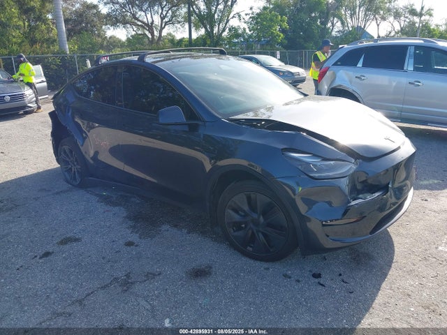 2024 TESLA MODEL Y 7SAYGDED7RF213420 Photo 0