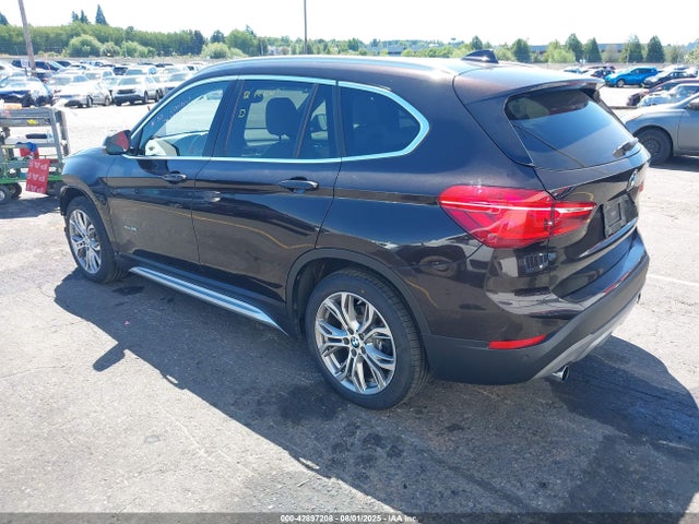 WBXHT3C32GP882634 BMW X1