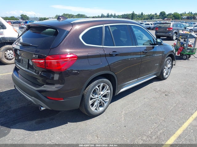 WBXHT3C32GP882634 BMW X1