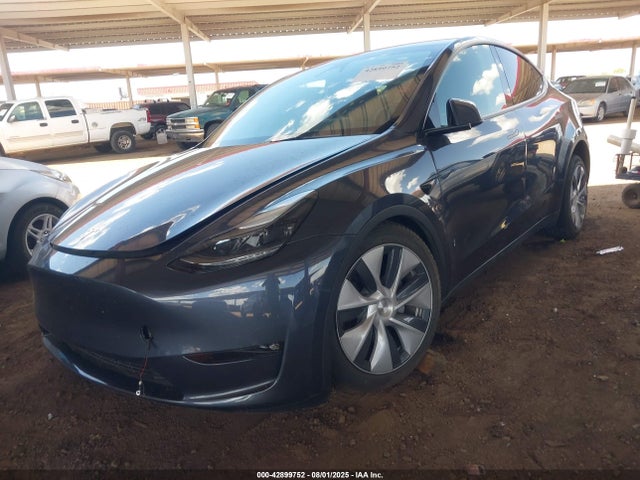 2023 TESLA MODEL Y 7SAYGDED8PF958819 Photo 1
