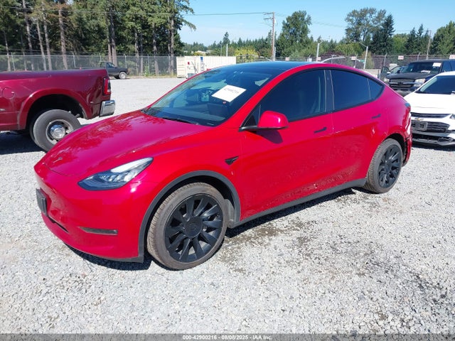 2021 TESLA MODEL Y 5YJYGAEE0MF199082 Photo 1