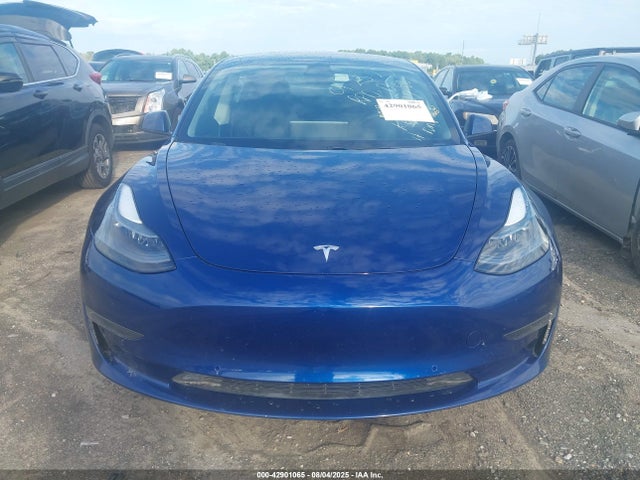5YJ3E1EAXMF017059 Tesla 2021