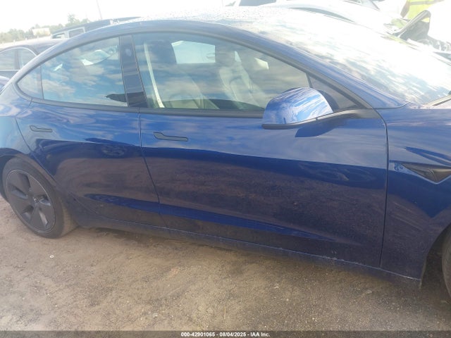 5YJ3E1EAXMF017059 Tesla 2021