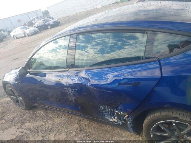 5YJ3E1EAXMF017059 Tesla 2021