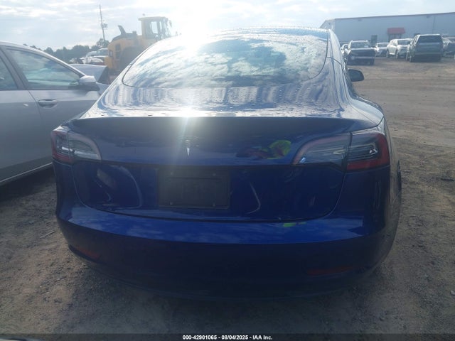 5YJ3E1EAXMF017059 Tesla 2021