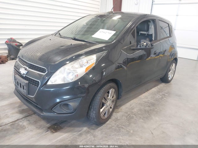 Chevrolet ll0 2015 KL8CA6S98FC804667 Image 2