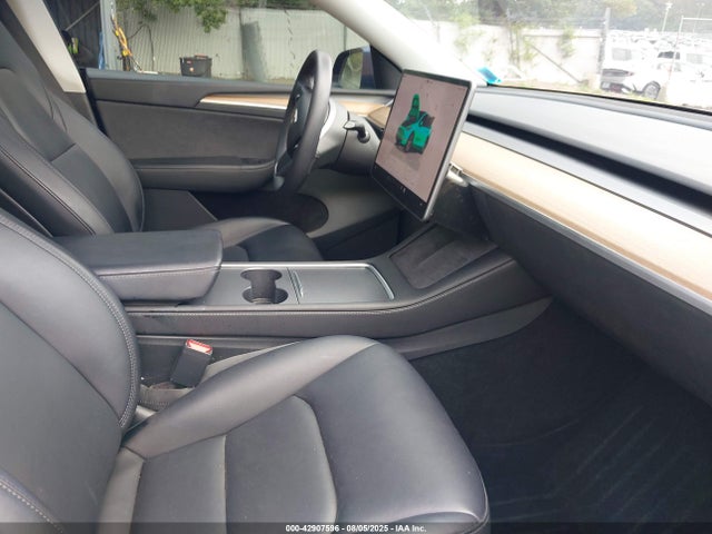 2023 TESLA MODEL Y 7SAYGDEE2PF669850 Photo 4