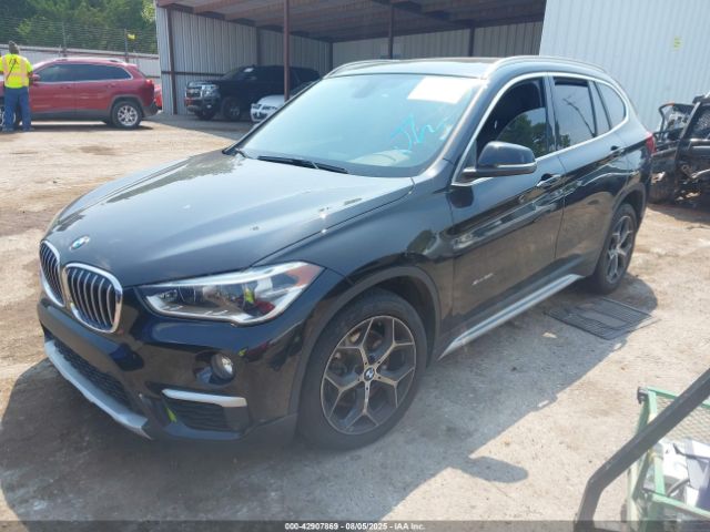 2016 BMW X1 WBXHT3C30GP885919 Photo 1