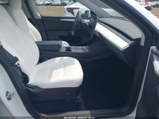2023 TESLA MODEL Y 7SAYGDEEXPF617236 Photo 4
