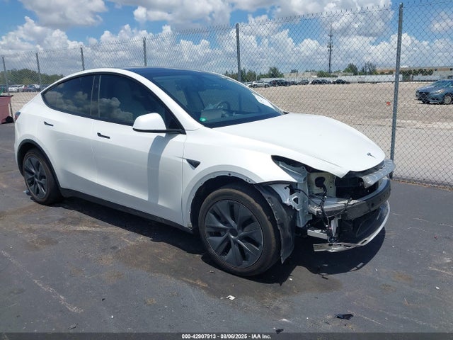 2025 TESLA MODEL Y 7SAYGDED9SF235330 Photo 0