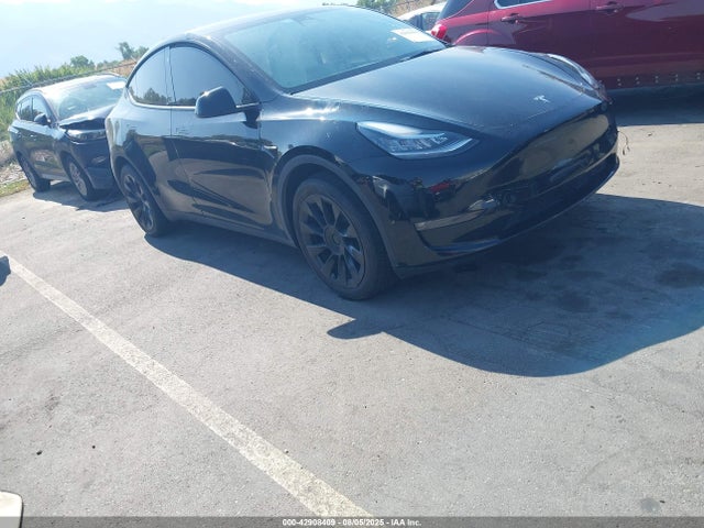 2023 TESLA MODEL Y 7SAYGDEE8PF616876 Photo 0