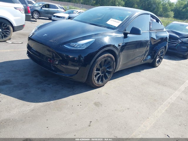 2023 TESLA MODEL Y 7SAYGDEE8PF616876 Photo 1