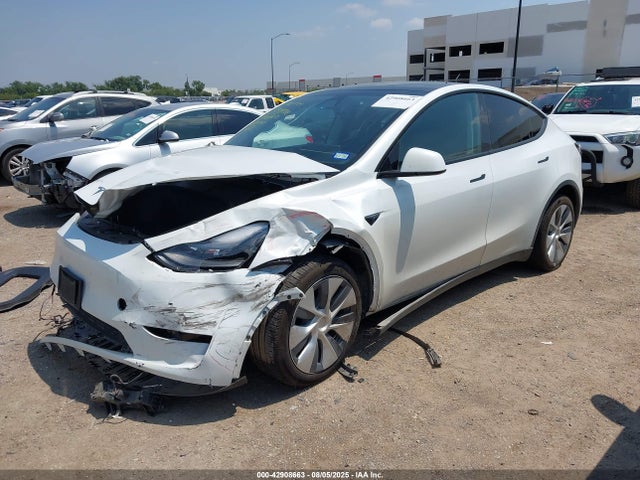 2024 TESLA MODEL Y 7SAYGDEE5RA275985 Photo 1