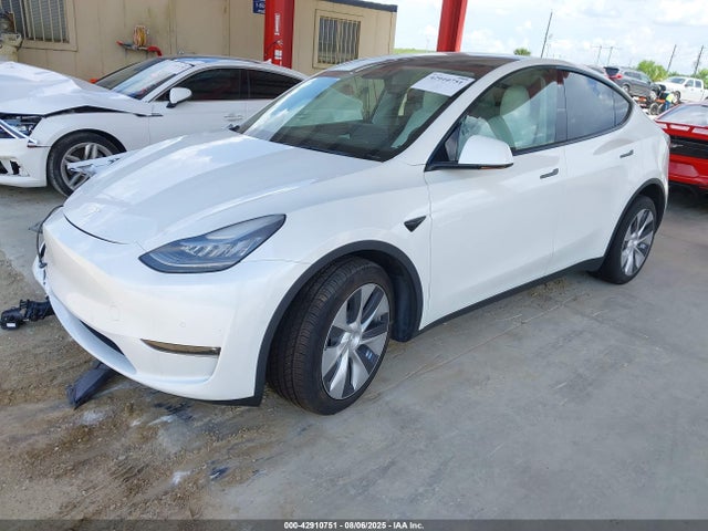 2021 TESLA MODEL Y 5YJYGAEE2MF189900 Photo 1
