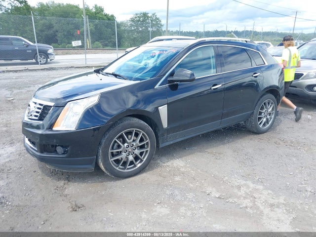 2016 CADILLAC SRX 3GYFNDE35GS505809 Photo 1