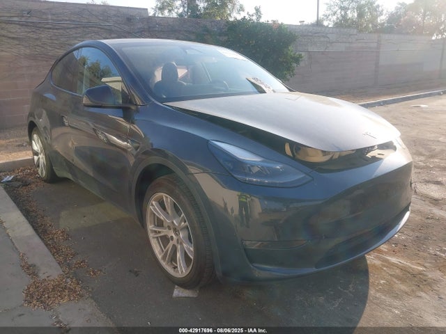 2024 TESLA MODEL Y 7SAYGDED5RF054624 Photo 0