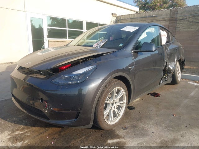 2024 TESLA MODEL Y 7SAYGDED5RF054624 Photo 1