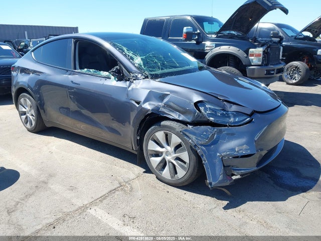 2023 TESLA MODEL Y 7SAYGDEE6PF716037 Photo 0
