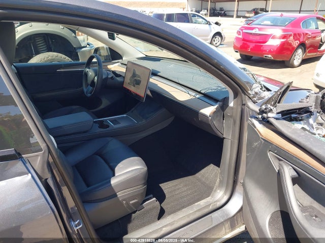 2023 TESLA MODEL Y 7SAYGDEE6PF716037 Photo 4