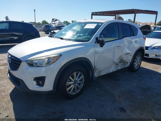 JM3KE2CY0G0653811 Mazda py