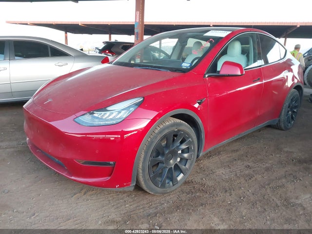 2021 TESLA MODEL Y 5YJYGAEE6MF303591 Photo 1